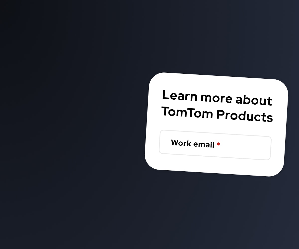 Tilted white card on dark gradient background reading "Learn more about TomTom Products" with a "Work email" input field.