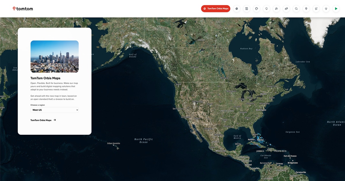 A digital map showing North America and parts of South America, with a sidebar displaying a city skyline and text about TomTom's map services.