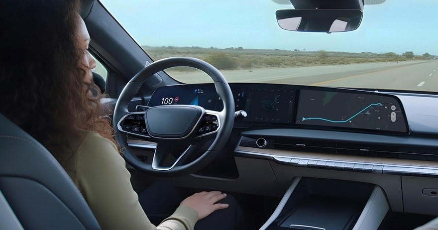 A driver using next-gen automotive technology