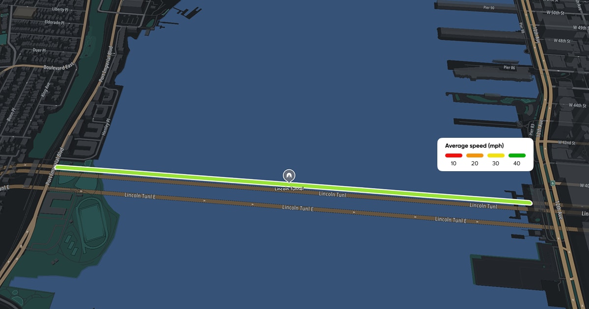 Map showing Lincoln Tunnel with a highlighted route indicating average speed in color gradients from red to green.