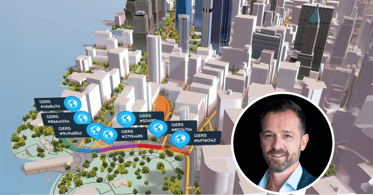 A digital cityscape model with data tags and an inset of a man's face in the lower right corner.
