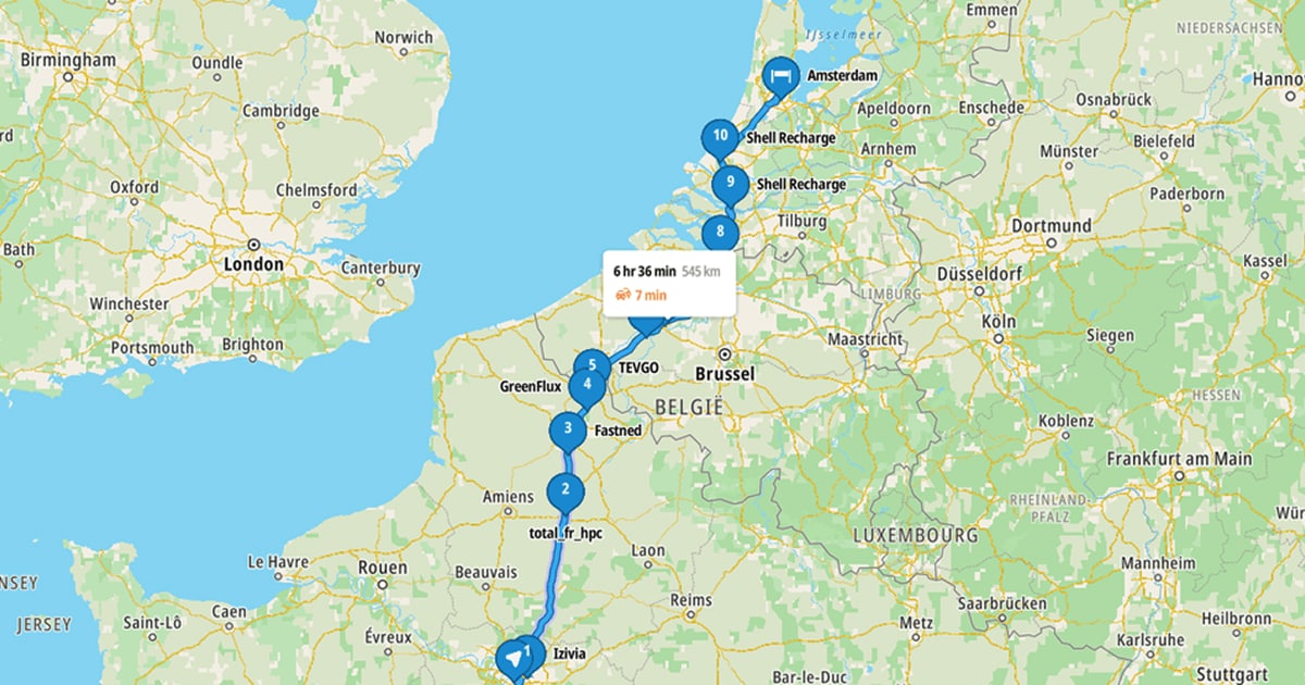 Map showing a route from northern France to Amsterdam with multiple charging stations marked, estimated travel time of 6 hours 36 minutes.