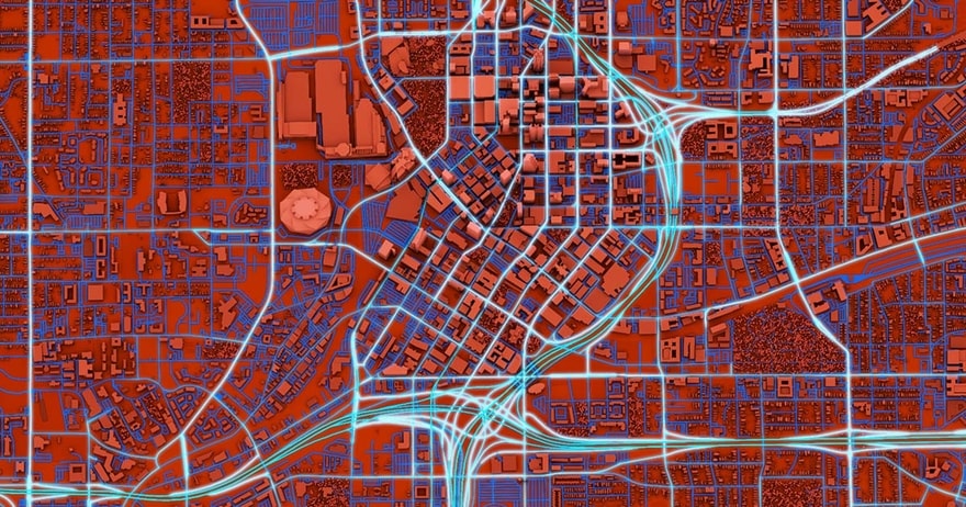 Abstract city map with red and blue color scheme, highlighting streets and buildings in a grid-like pattern.