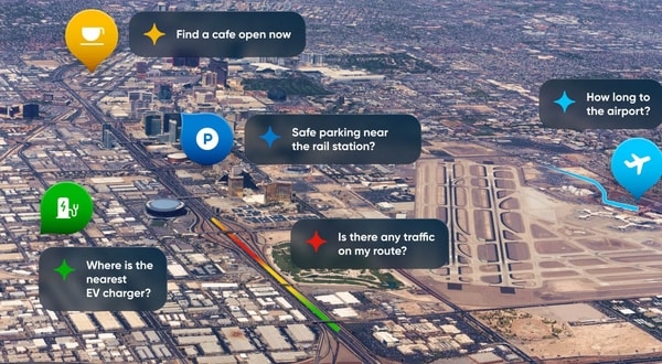 Aerial view of a city with icons for finding cafes, parking, EV chargers, traffic routes, and directions to the airport.