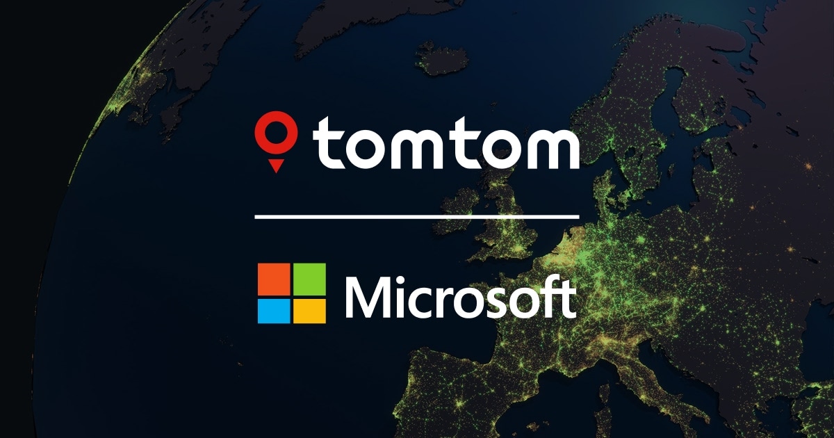 TomTom and Microsoft logos on a satellite view of Europe at night, with glowing city lights visible across the continent.