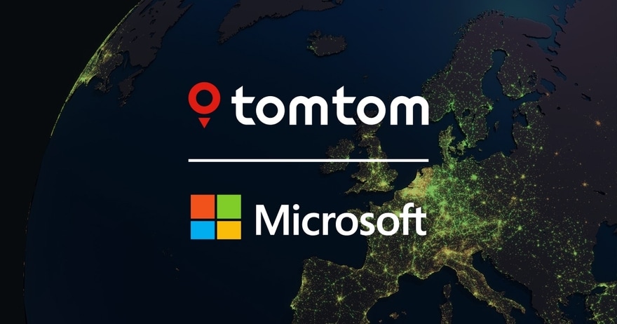 TomTom and Microsoft logos on a satellite view of Europe at night, with glowing city lights visible across the continent.