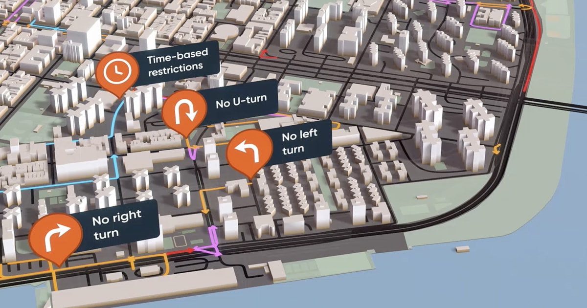 3D city map by waterfront with colored route lines and orange pins marking No right turn, No U-turn, No left turn and time-based restrictions.