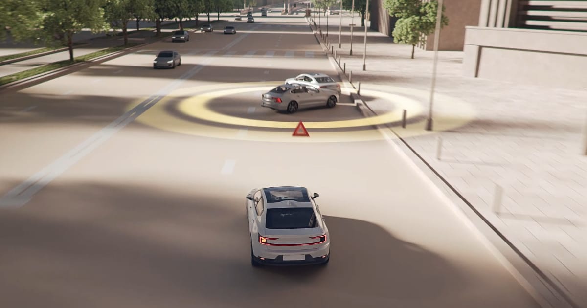 A car detects an obstacle on the road using a sensor, indicated by a yellow circle, while another car approaches from behind.