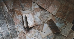 An image of paper maps