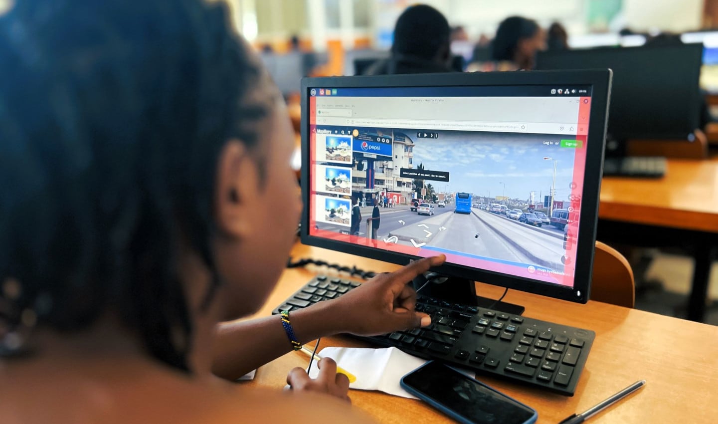 A community mapper using street imagery to edit a map