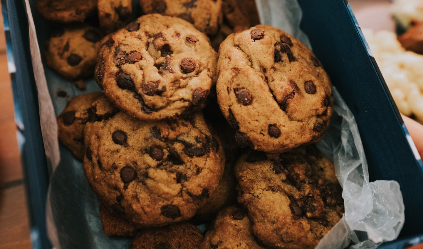 Picture of a basket of fresh, chocolate chip cookies