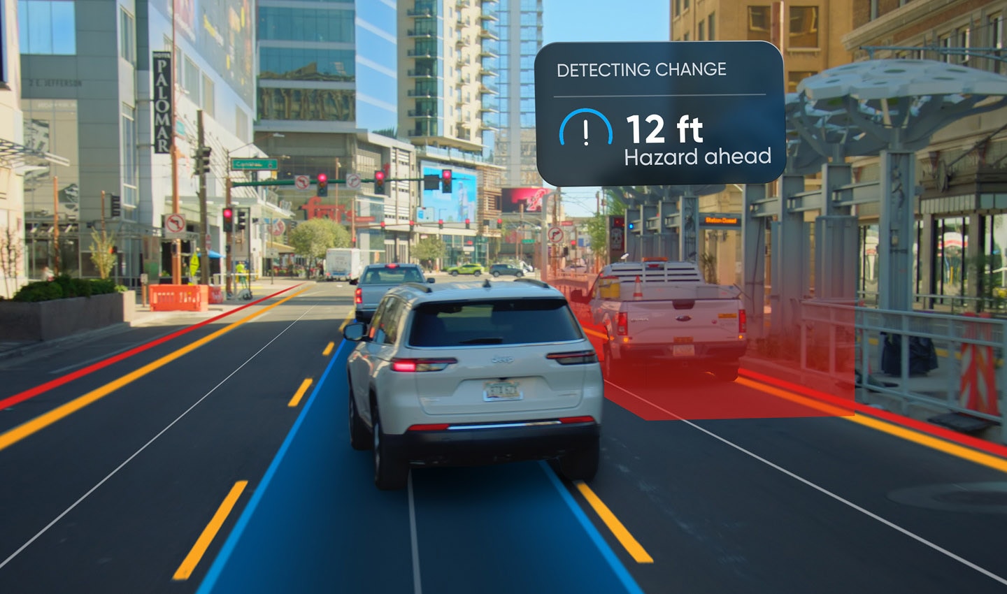 an image of a car on a screen with the ADAS system detecting and communicating a hazard ahead