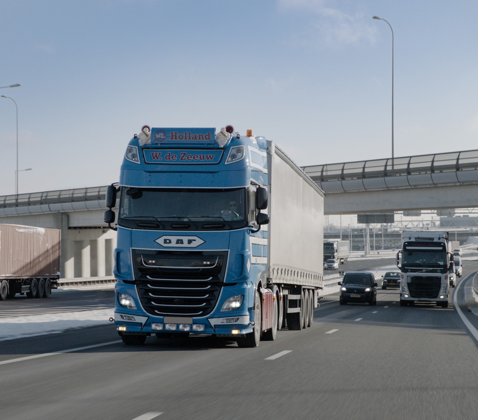 A truck driving in the highway