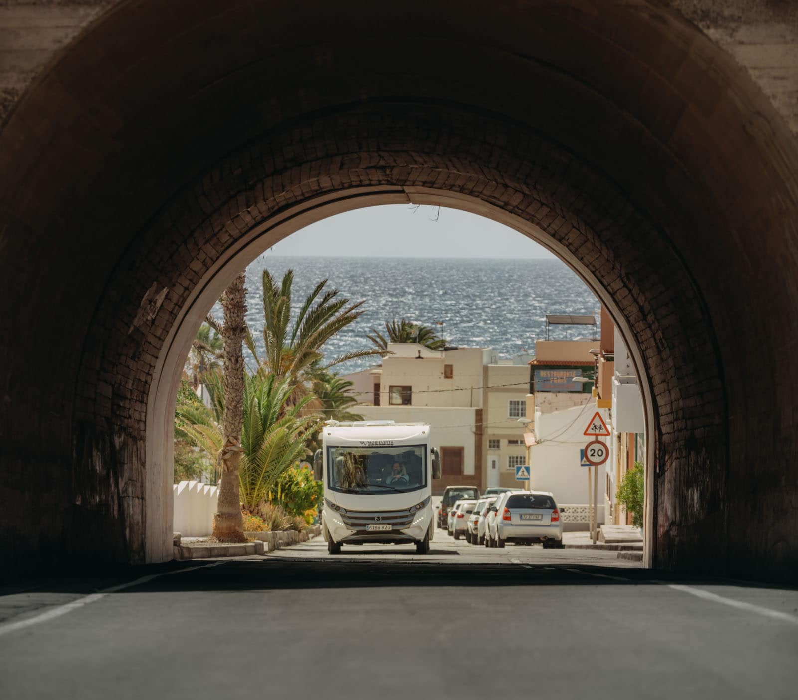 a camper heading towards a tunnel