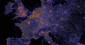 Stylized map of Europe showing major urban areas in orange and transport routes in blue lines on a dark background.