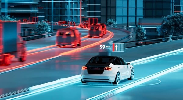 A white autonomous car drives on a digital highway with projected speed data, surrounded by glowing vehicles and urban scenery.