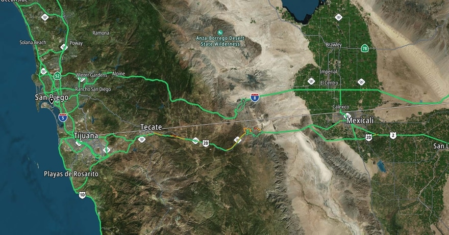 Satellite map showing San Diego, Tijuana, Tecate, and Mexicali with road networks and natural terrain, including the Anza-Borrego Desert.