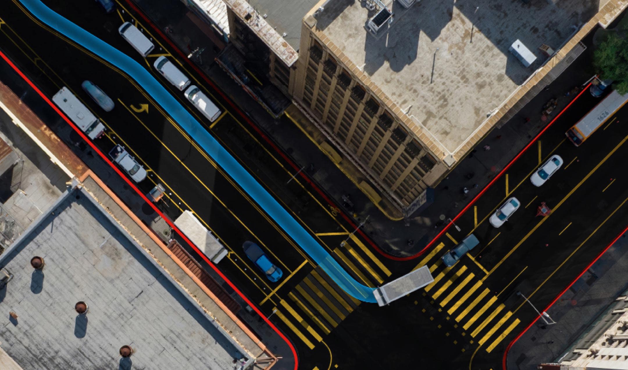 Bird's eye view of an ADAS system helping a bus take a turn into the right lane