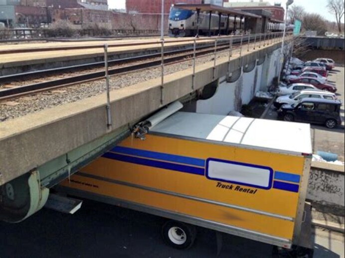 truck-stuck-in-bridge