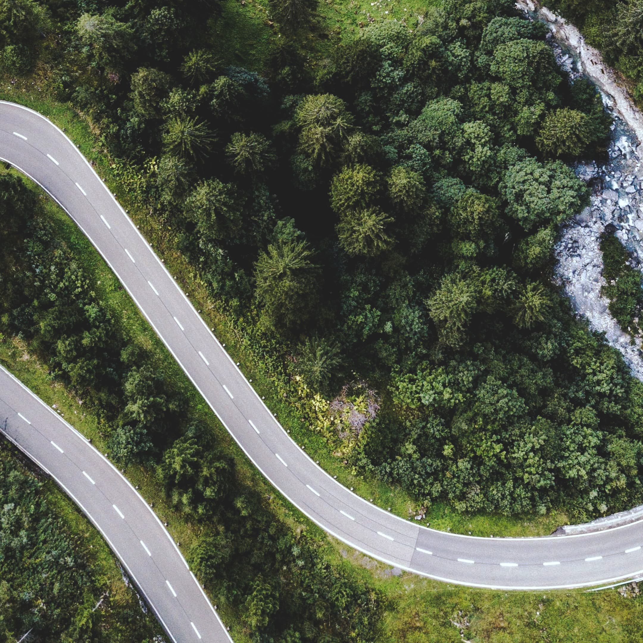 Birdview of an amazing hilly road, discover more roads like this on Road Trips by TomTom